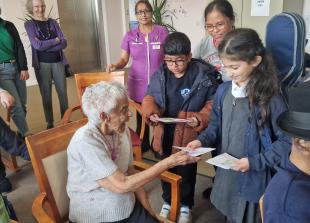 Youngsters share festive cheer with Slough care home residents