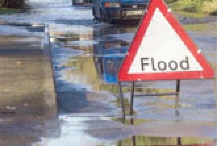Flooding closes Long Lane in Tilehurst