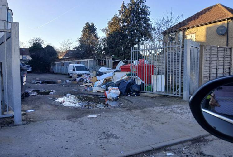 Residents hit out at 'eyesore' rubbish pile behind Slough flats